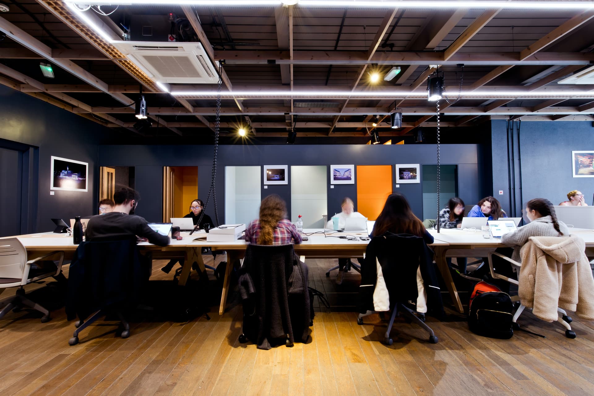 Group of people working at a desk. Image credit: Ewan Buck.